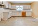 Kitchen featuring white cabinets and a window over the sink at , Atlanta, GA 30310