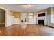 Wide angle shot of the living room showing hardwood floors, fireplace, and open layout at , Atlanta, GA 30310