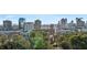 Areal shot of the city skyline from the neighborhood's tree lined streets at 1031 Eulalia Ne Rd, Atlanta, GA 30319