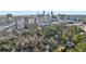 Incredible aerial view of the neighborhood with the city skyline in the distance at 1031 Eulalia Ne Rd, Atlanta, GA 30319