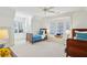 Bright bedroom with large windows, twin beds, and a bay window seat at 1031 Eulalia Ne Rd, Atlanta, GA 30319