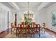 Elegant dining room featuring classic chandelier, wood floors, and refined detailing at 1031 Eulalia Ne Rd, Atlanta, GA 30319