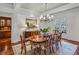 Elegant dining room featuring hardwood floors and a statement chandelier above table at 1031 Eulalia Ne Rd, Atlanta, GA 30319