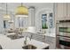 Bright kitchen features stainless steel appliances, light countertops, and modern fixtures at 1031 Eulalia Ne Rd, Atlanta, GA 30319