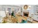 Bright, stylish living room featuring fireplace, bookshelves, and cozy seating at 1031 Eulalia Ne Rd, Atlanta, GA 30319