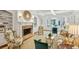 Cozy living room with fireplace, built-in shelves, and comfortable seating at 1031 Eulalia Ne Rd, Atlanta, GA 30319