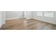 Bright open living space features hardwood floors, wainscoting, and natural light at 4477 Bethany Manor Dr, Snellville, GA 30039