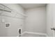 Walk-in closet has custom shelving for maximum storage and organization at 4477 Bethany Manor Dr, Snellville, GA 30039