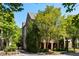 Exterior home elevation surrounded by trees and landscaping at 970 N Ormewood Park Se Dr, Atlanta, GA 30316