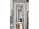 Hallway view shows open floor plan and door leading outside with a window view at 970 N Ormewood Park Se Dr, Atlanta, GA 30316
