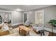 Comfortable living room featuring neutral walls, hardwood floors, and stylish furnishings at 970 N Ormewood Park Se Dr, Atlanta, GA 30316