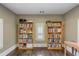 Cozy office space with hardwood floors, built-in bookshelves, and natural light at 970 N Ormewood Park Se Dr, Atlanta, GA 30316