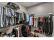 Organized walk-in closet with shelves, hanging racks, and space for shoe storage at 970 N Ormewood Park Se Dr, Atlanta, GA 30316