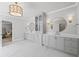Beautiful bathroom with double vanity, stunning light fixture, and white countertops at 126 Owens Mill Pl, Canton, GA 30115