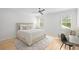 Well-lit bedroom features neutral tones, with an area to relax and work from home at 126 Owens Mill Pl, Canton, GA 30115