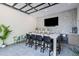 Entertainment room featuring bar seating, a television, and modern finishes at 126 Owens Mill Pl, Canton, GA 30115