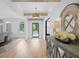 Beautiful foyer featuring hardwood floors, exposed beams, and stylish decor at 126 Owens Mill Pl, Canton, GA 30115