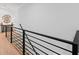 Modern staircase with sleek railing and natural light, leading to upper level at 126 Owens Mill Pl, Canton, GA 30115