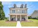 Charming two-story home with a welcoming front porch, perfect for relaxing outdoors at 2770 Nautical Way, Villa Rica, GA 30180