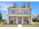 Charming two-story home with a welcoming front porch and well-manicured lawn at 2770 Nautical Way, Villa Rica, GA 30180