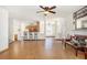 Open concept living room and kitchen with tile flooring and bar seating at 2770 Nautical Way, Villa Rica, GA 30180