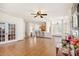 Open concept living area with access to the kitchen with bar seating and abundant natural light at 2770 Nautical Way, Villa Rica, GA 30180
