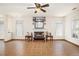 Open living room with tile flooring, fireplace, and windows, perfect for entertaining guests at 2770 Nautical Way, Villa Rica, GA 30180