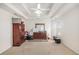 Spacious main bedroom with tray ceiling, ceiling fan, and carpet floors at 2770 Nautical Way, Villa Rica, GA 30180