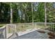 The property boasts an outdoor back deck, ideal for enjoying nature and outdoor living at 4954 Browns Mill Rd, Lithonia, GA 30038