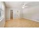 Bright bedroom featuring hardwood flooring and two closets at 4954 Browns Mill Rd, Lithonia, GA 30038