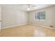 Spacious bedroom with hardwood flooring and ceiling fan at 4954 Browns Mill Rd, Lithonia, GA 30038