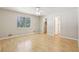 Bedroom featuring hardwood flooring, ceiling fan, window and closets at 4954 Browns Mill Rd, Lithonia, GA 30038