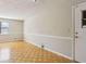 Bright living room with hardwood floors, and neutral wall color, ready for personalized touches at 4954 Browns Mill Rd, Lithonia, GA 30038