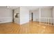 Bright living room with hardwood floors, and neutral wall color, ready for personalized touches at 4954 Browns Mill Rd, Lithonia, GA 30038