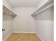 Walk-in closet offering ample storage with wooden shelving at 4954 Browns Mill Rd, Lithonia, GA 30038