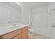 Well-lit bathroom features a vanity, sink, toilet and a shower/tub at 6330 Shell Sw Dr, Atlanta, GA 30331