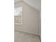 Bright bedroom featuring a large window at 6330 Shell Sw Dr, Atlanta, GA 30331