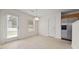 Bright dining area with stainless steel refrigerator and access to the backyard at 6330 Shell Sw Dr, Atlanta, GA 30331