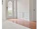 Lovely foyer with hardwood flooring and decorative trim on the walls at 6330 Shell Sw Dr, Atlanta, GA 30331