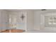 Spacious living room with hardwood flooring that flows into the dining and foyer at 6330 Shell Sw Dr, Atlanta, GA 30331