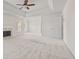 Spacious main bedroom with a fireplace, ceiling fan, and tray ceiling at 6330 Shell Sw Dr, Atlanta, GA 30331