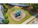 Overhead shot of a well-maintained playground featuring slides and climbing structures in a fenced area at 6330 Shell Sw Dr, Atlanta, GA 30331
