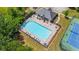 Aerial view of a community swimming pool and clubhouse in a residential neighborhood at 6330 Shell Sw Dr, Atlanta, GA 30331
