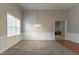 Open-concept dining room with a view into the kitchen at 7161 Boulder Pass, Union City, GA 30291