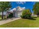 Traditional single-Gathering home with a two-car garage, showcasing great curb appeal at 7161 Boulder Pass, Union City, GA 30291