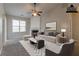 Virtually staged living room with fireplace, rug, sofa and other decor at 7161 Boulder Pass, Union City, GA 30291