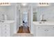 A well-lit bathroom offers double sinks with plenty of counter space and storage at 1255 Hidden Creek Pt, Cumming, GA 30040