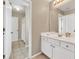 A clean bathroom offers a single sink and shower with bathtub at 1255 Hidden Creek Pt, Cumming, GA 30040