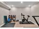 Home gym with exercise equipment, including a stationary bike, for a convenient fitness routine at 1255 Hidden Creek Pt, Cumming, GA 30040