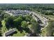 An aerial view of a new community featuring a forest and green space at 1730 Fulmont Cir, Mableton, GA 30126